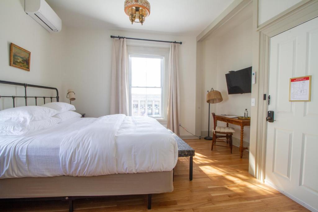 Postel nebo postele na pokoji v ubytování Pert House