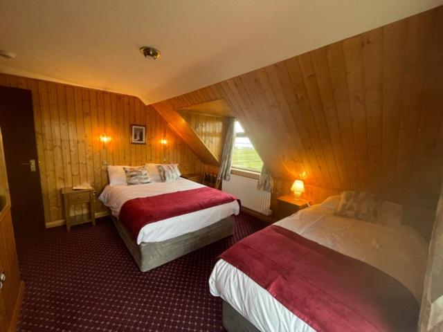Postel nebo postele na pokoji v ubytování Ard Einne House Bed & Breakfast