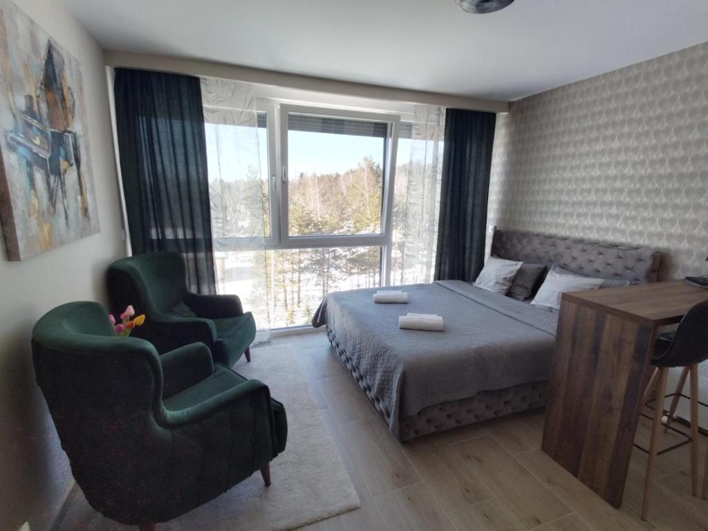 Un lugar para sentarse en Apartman Ambijent Divcibare