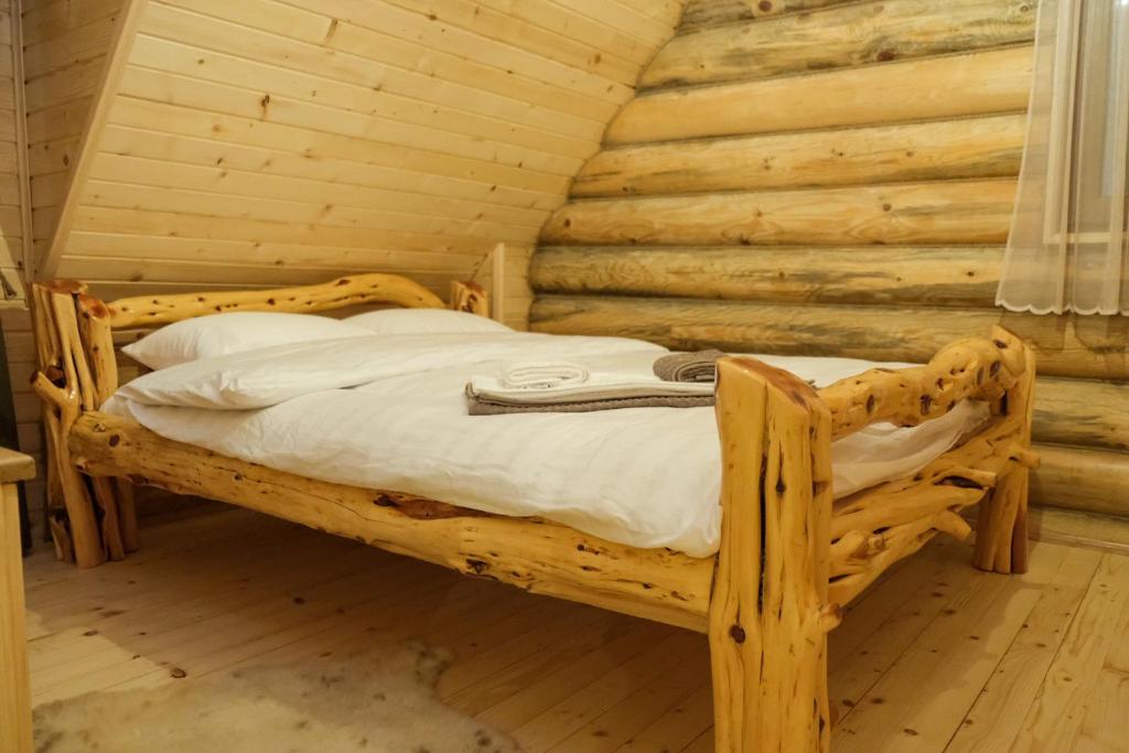 Krevet ili kreveti u jedinici u okviru objekta Drvena Kuca RUŽA
