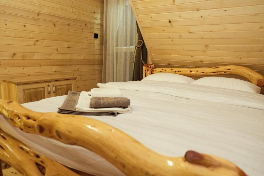 Krevet ili kreveti u jedinici u okviru objekta Drvena Kuca RUŽA