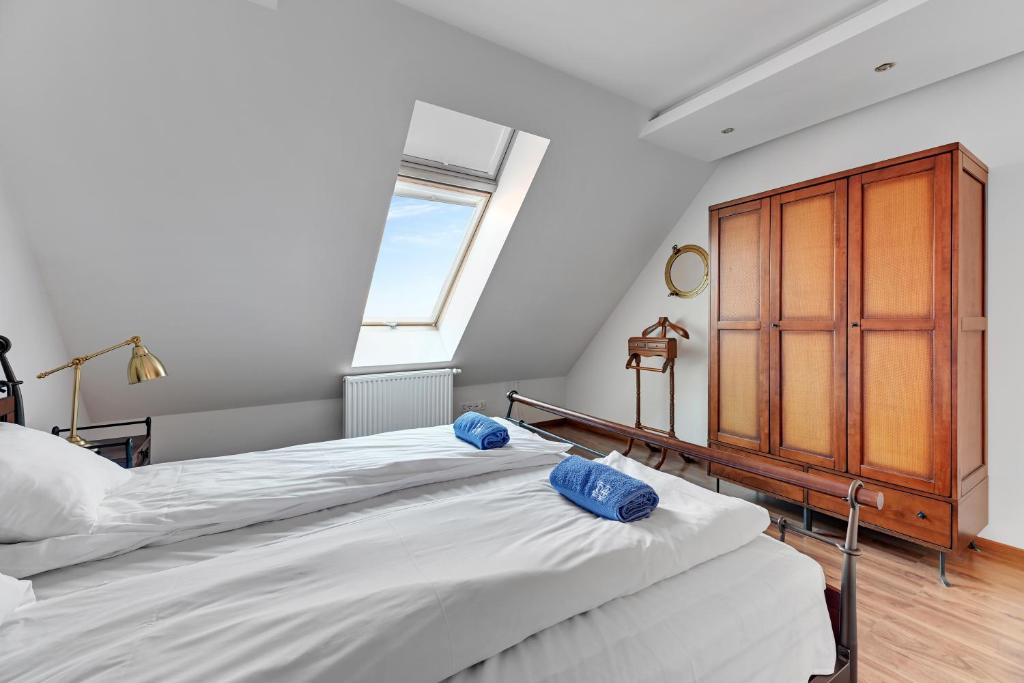 Posteľ alebo postele v izbe v ubytovaní Apartament Penthouse Q4Apartments