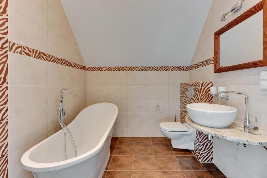 Kúpeľňa v ubytovaní Apartament Penthouse Q4Apartments