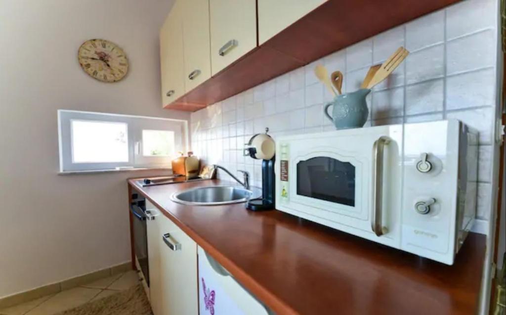 Kuchyňa alebo kuchynka v ubytovaní Apartment with sea view
