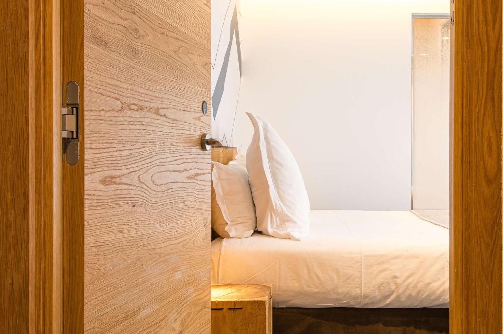 Postel nebo postele na pokoji v ubytování Best Western Chalet les Saytels