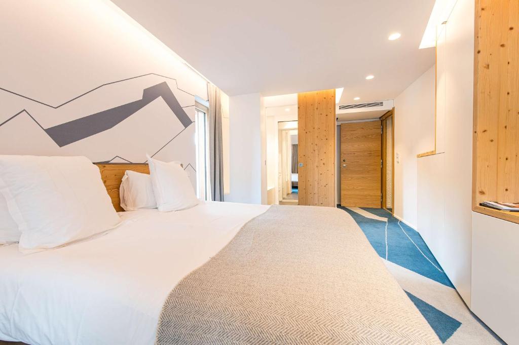 Postel nebo postele na pokoji v ubytování Best Western Chalet les Saytels
