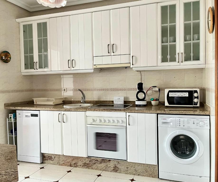 Kuchyň nebo kuchyňský kout v ubytování Apartamento Turístico Casa Bari