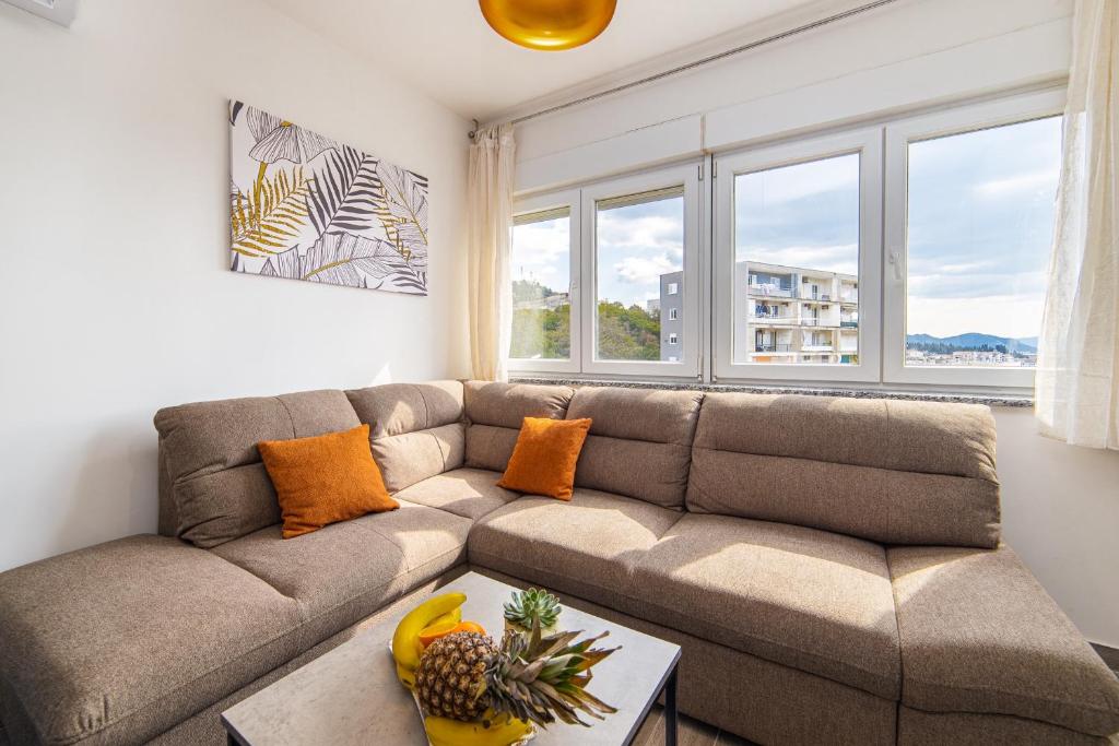 Posezení v ubytování Apartment Sunrise Ploče