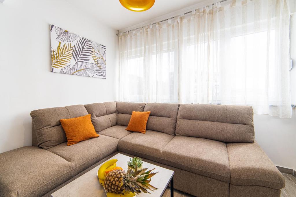 Posezení v ubytování Apartment Sunrise Ploče