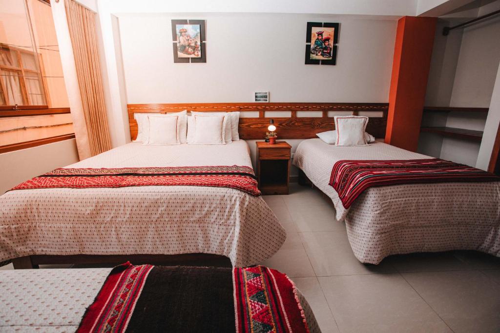 Postel nebo postele na pokoji v ubytování Dreams House Cusco