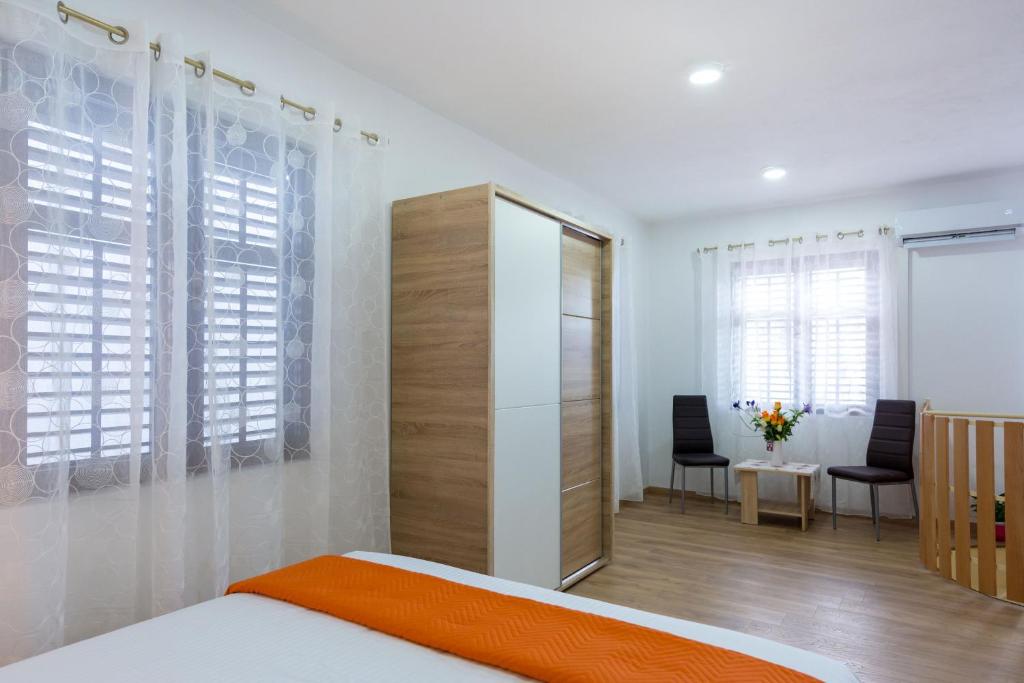 Posteľ alebo postele v izbe v ubytovaní Apartment Bralic