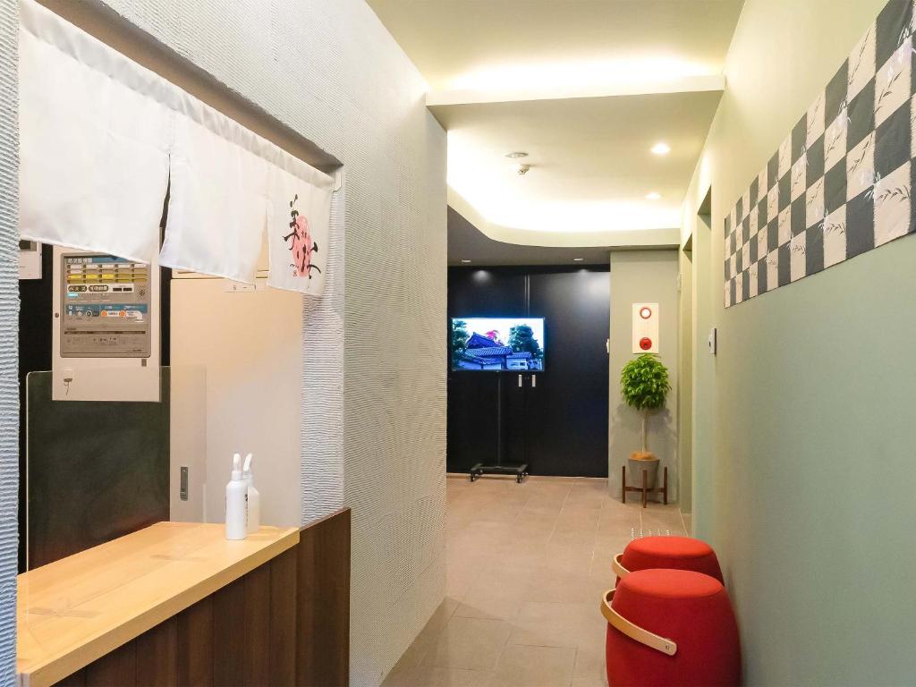 TV a/nebo společenská místnost v ubytování Kyoto inn Mio