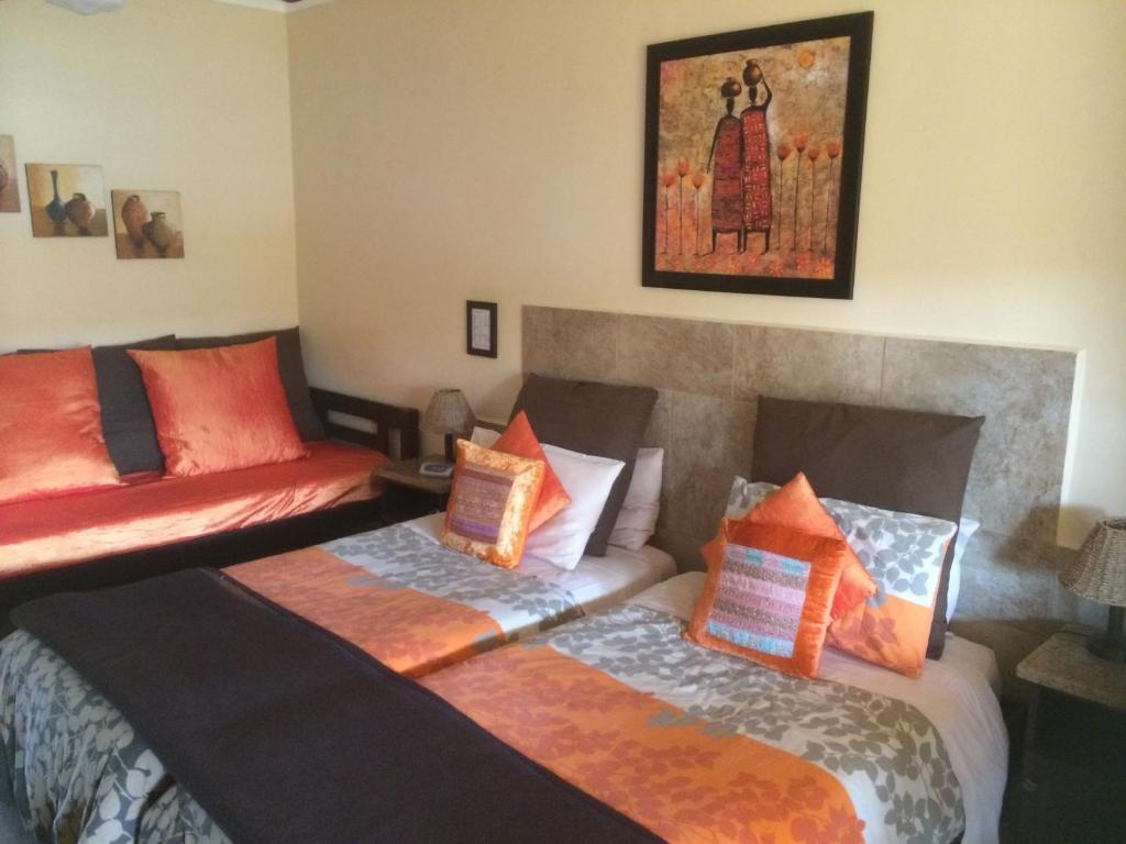 Cama o camas de una habitación en Auberge Guest Lodge