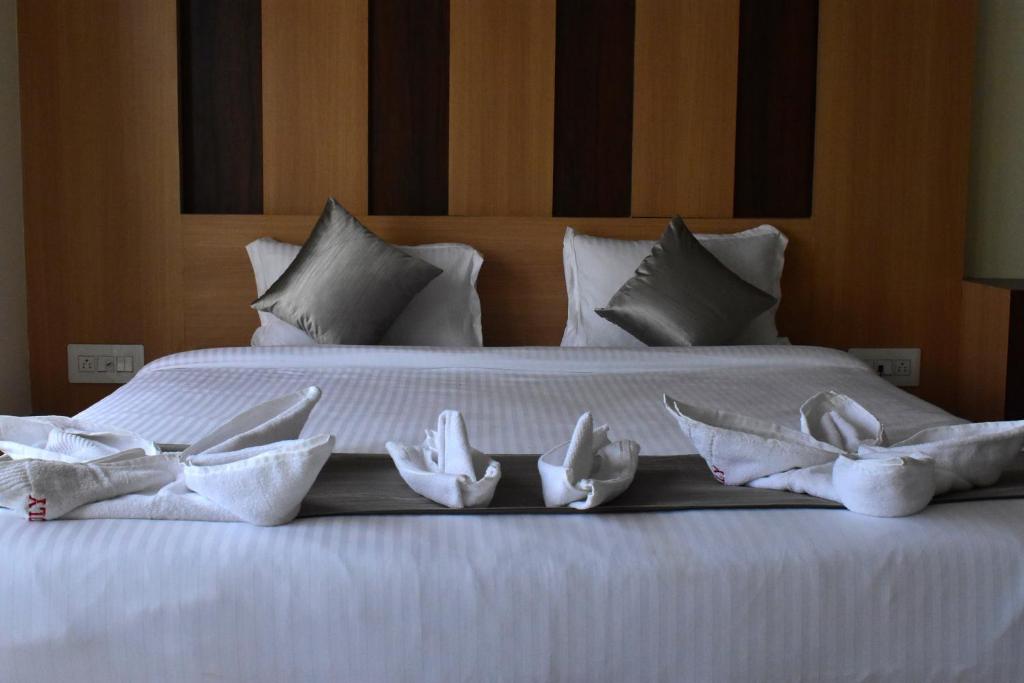 Postel nebo postele na pokoji v ubytování Hotel Ridley International