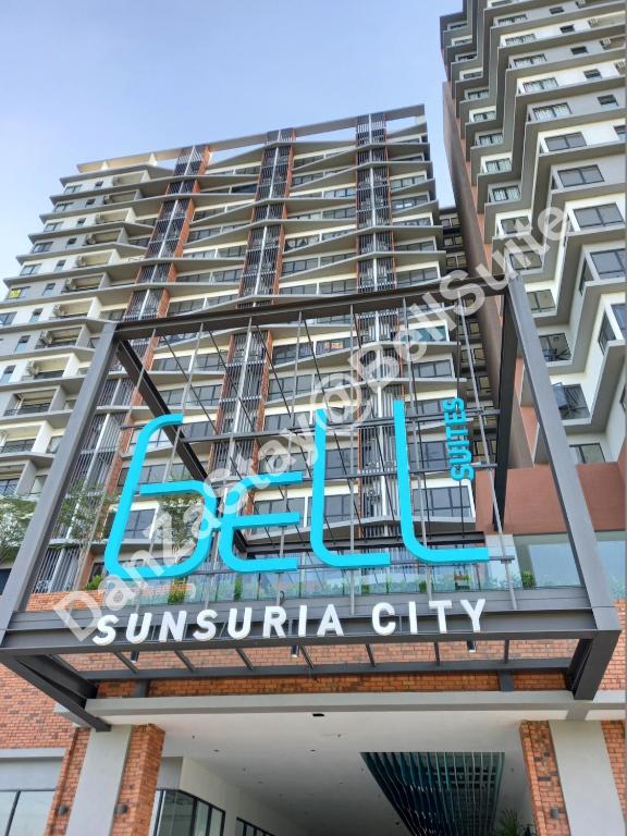 a building with a sign for the sunbury city at DanZaStay@BellSuite in Sepang