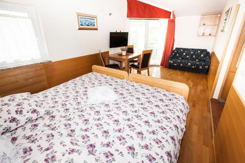 Postel nebo postele na pokoji v ubytování B&B Pansion Vago