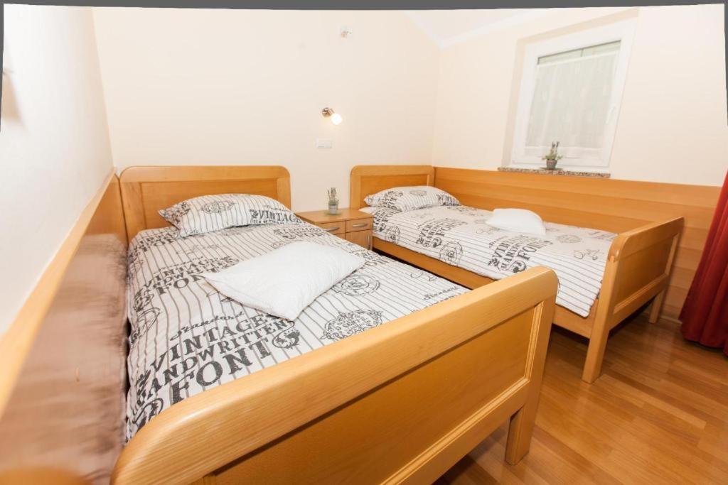 Postel nebo postele na pokoji v ubytování B&B Pansion Vago