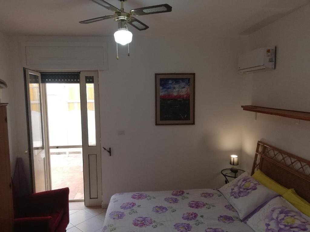 Łóżko lub łóżka w pokoju w obiekcie Rif. 086 e 087 Maldive di SalentoINvacanza.Com