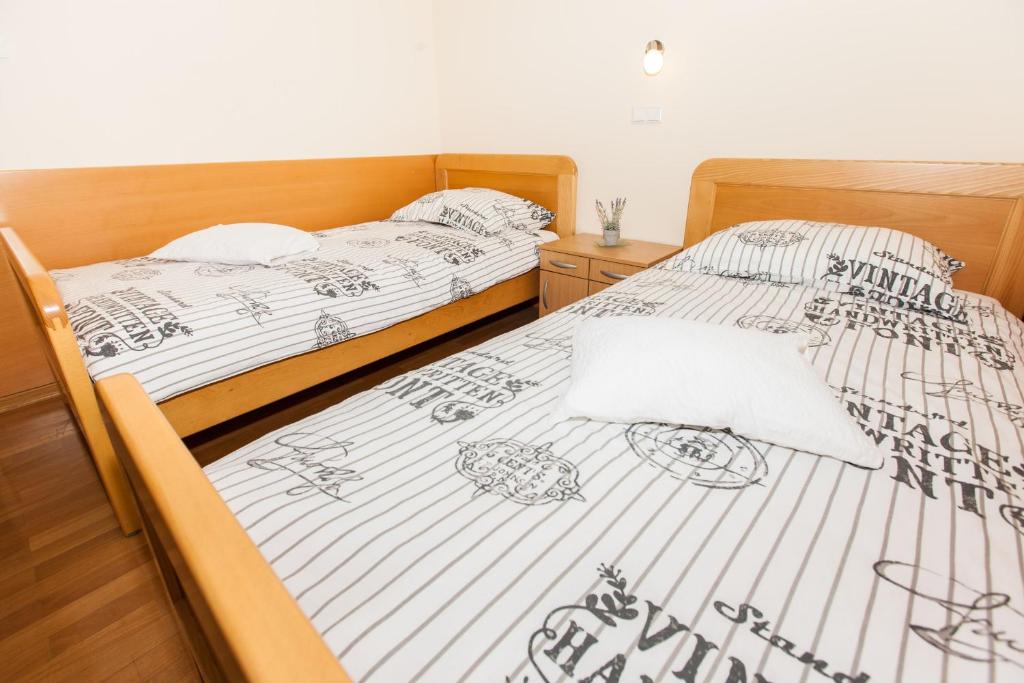 Postel nebo postele na pokoji v ubytování B&B Pansion Vago