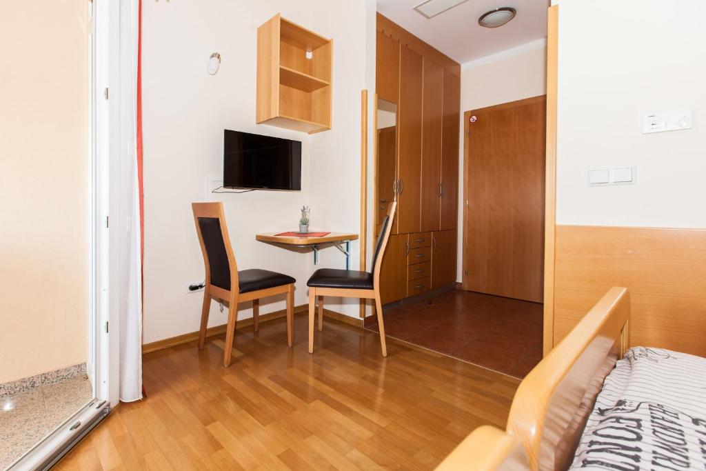 TV a/nebo společenská místnost v ubytování B&B Pansion Vago