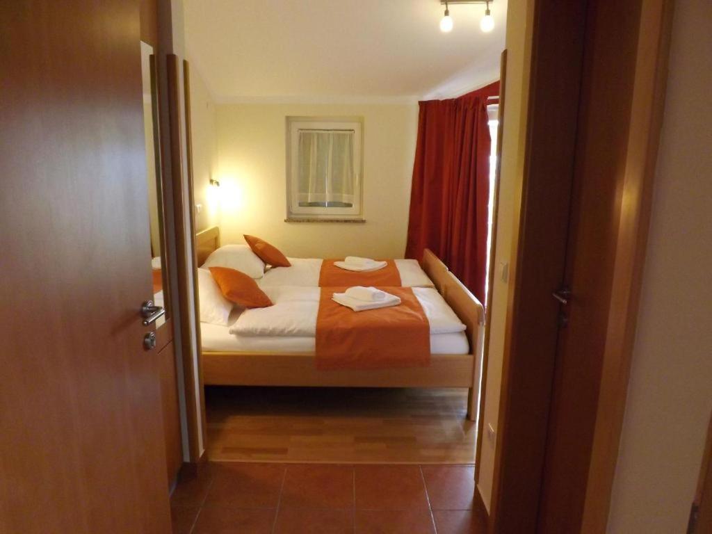 Postel nebo postele na pokoji v ubytování B&B Pansion Vago