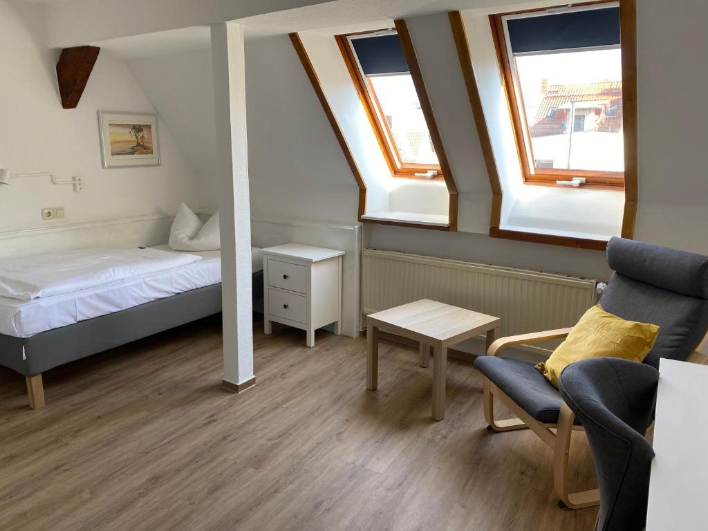 Postel nebo postele na pokoji v ubytování Norddeutscher Hof