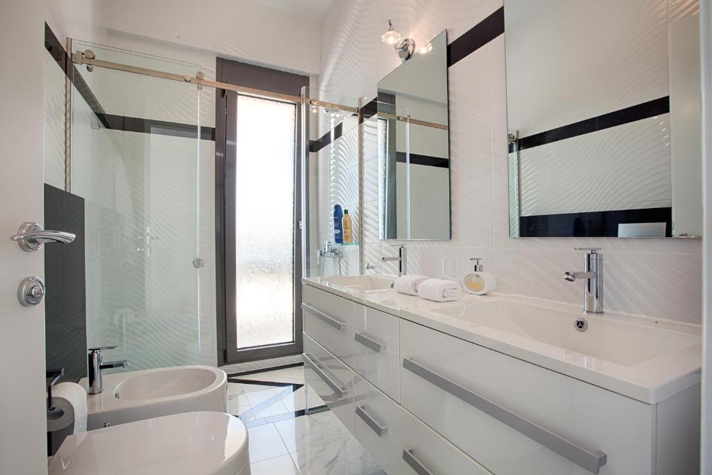Kúpeľňa v ubytovaní Villa White Pearl