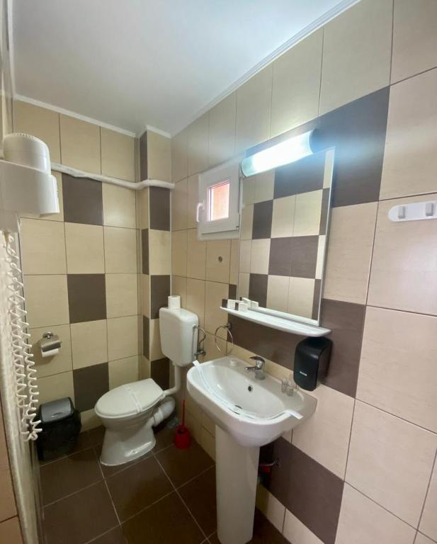 Ванная комната в Hotel Sunset Beach Vama Veche