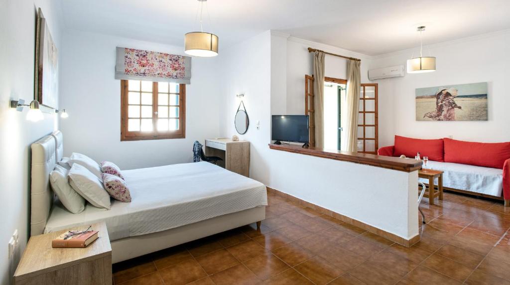 Postel nebo postele na pokoji v ubytování CORFU PELAGOS HOTEL