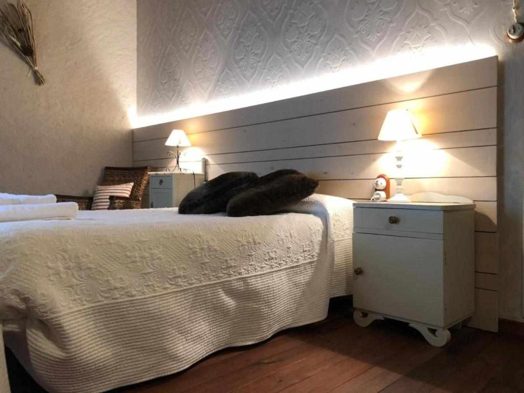 Una cama o camas en una habitación de Casa Espunyes Classic