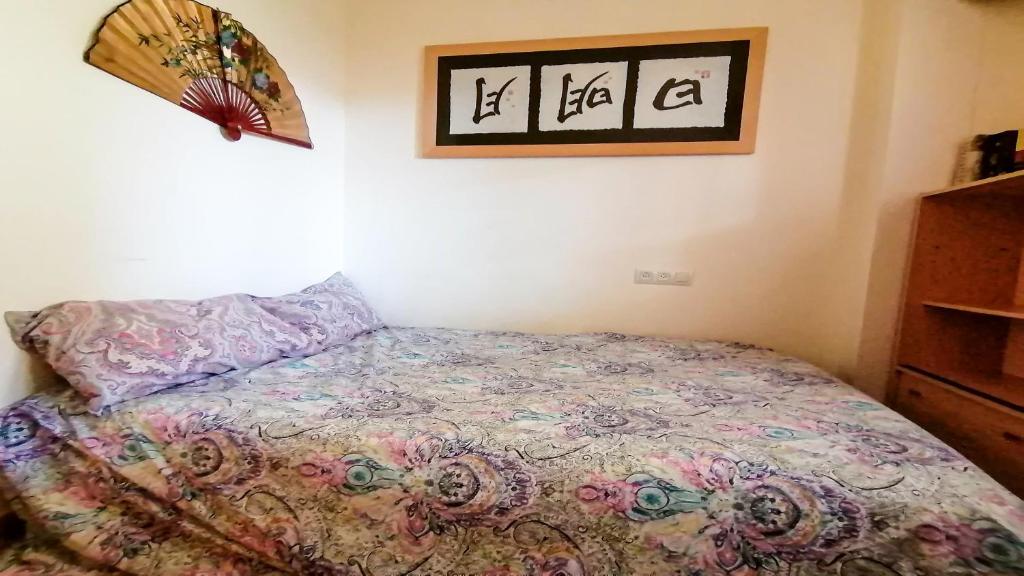 Posteľ alebo postele v izbe v ubytovaní VACAY Dúplex Gala, jardín, aire libre, sol, en la Costa Brava, L'Escala!