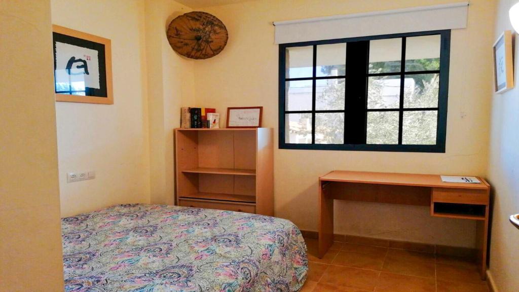 Posteľ alebo postele v izbe v ubytovaní VACAY Dúplex Gala, jardín, aire libre, sol, en la Costa Brava, L'Escala!