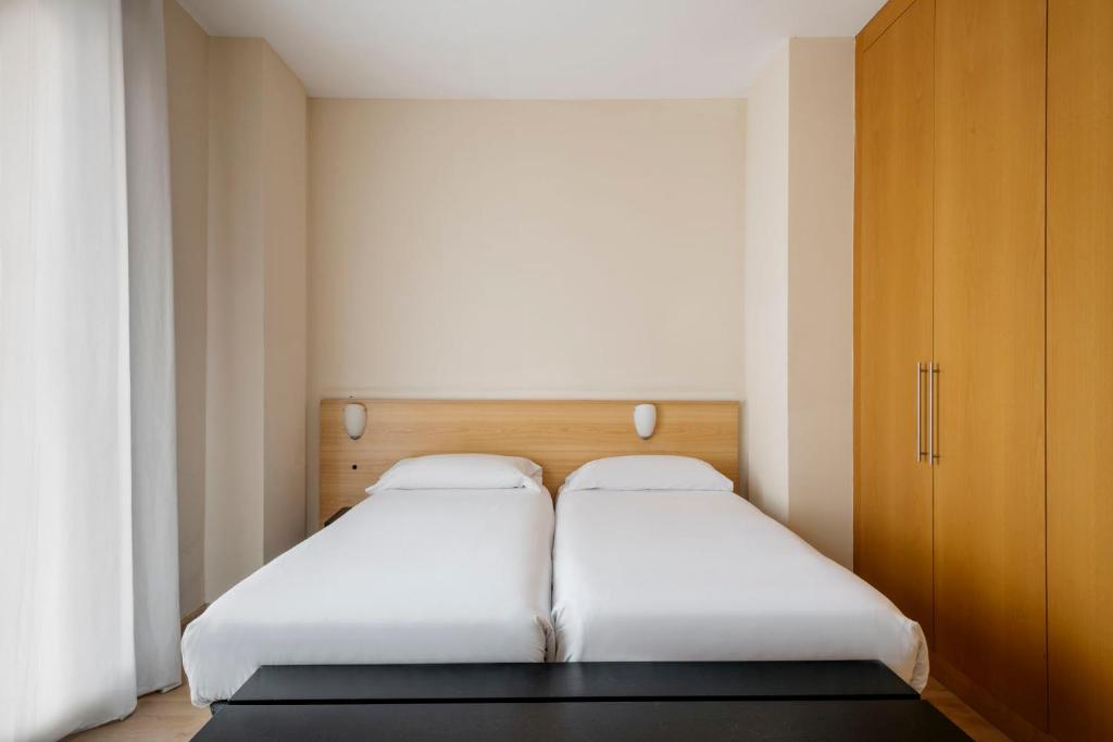 Postel nebo postele na pokoji v ubytování Barcelona Apartment Villarroel