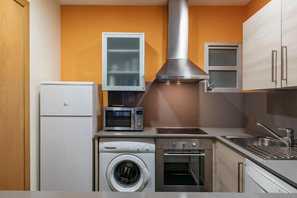 Kuchyň nebo kuchyňský kout v ubytování Barcelona Apartment Villarroel