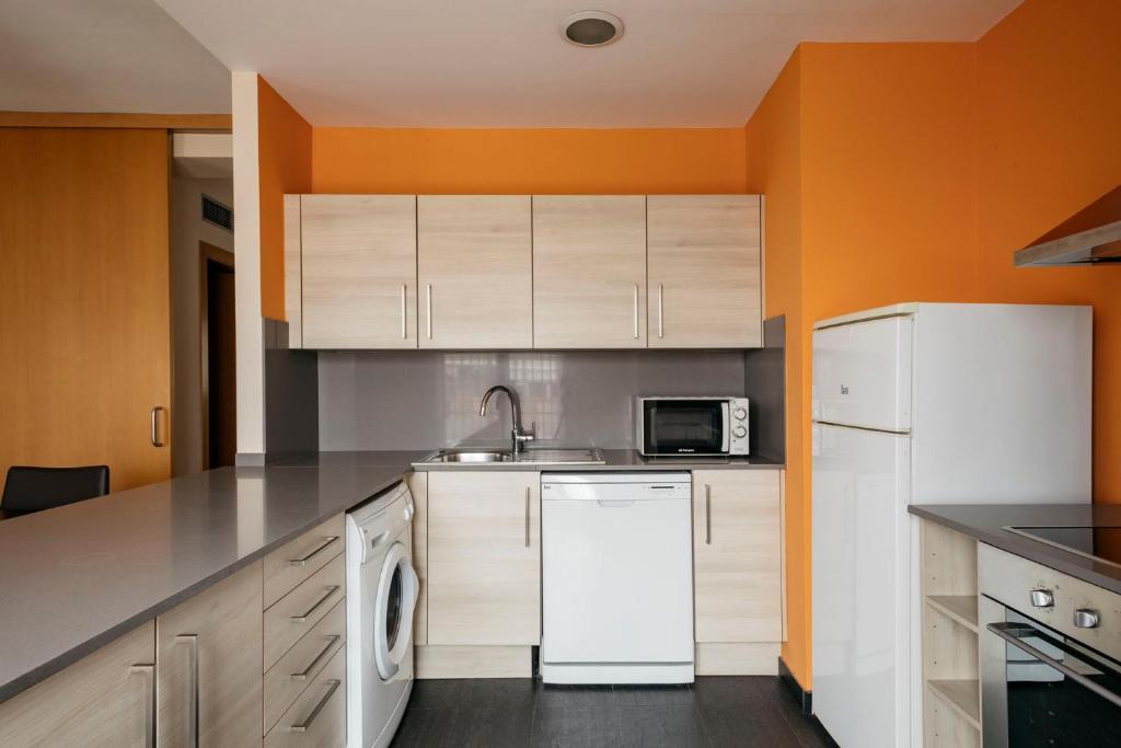 Kuchyň nebo kuchyňský kout v ubytování Barcelona Apartment Villarroel