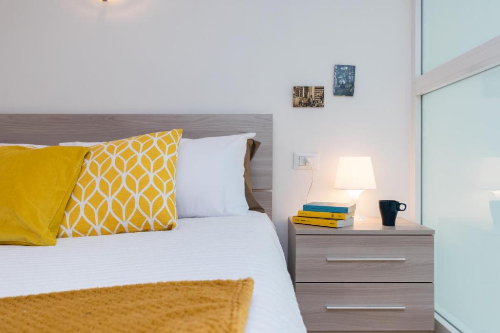 A bed or beds in a room at That's a Mole by Wonderful Italy