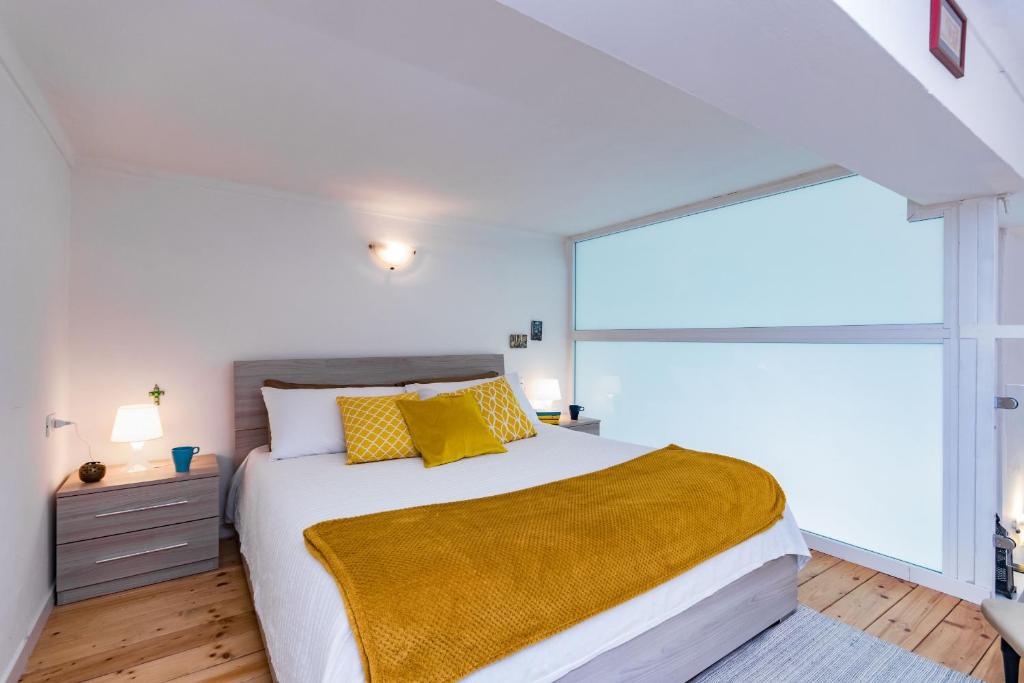 A bed or beds in a room at That's a Mole by Wonderful Italy