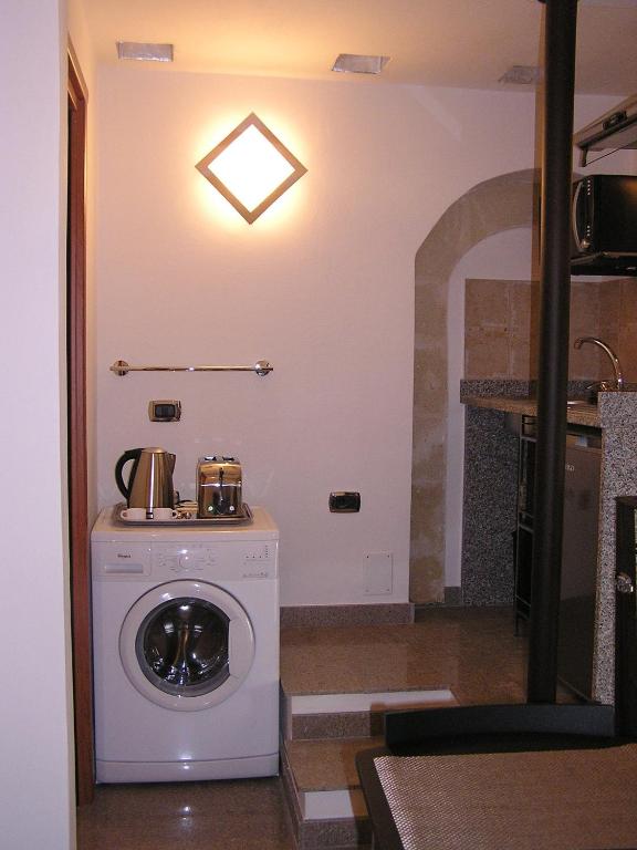 Kuchyň nebo kuchyňský kout v ubytování Art Transparent B&B