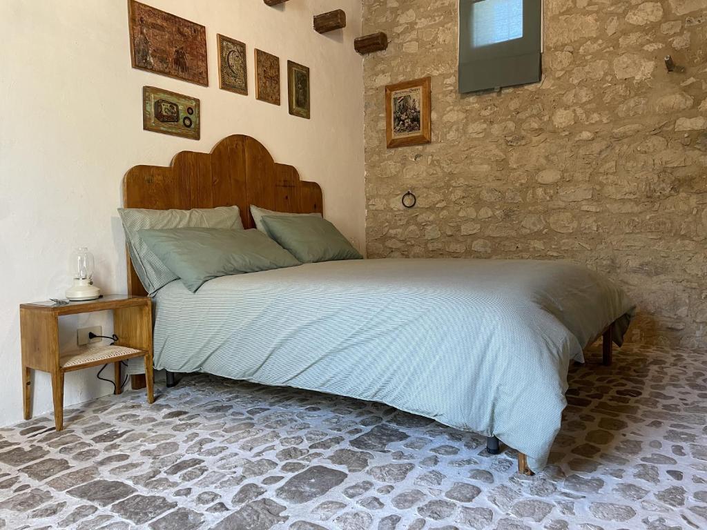 Postel nebo postele na pokoji v ubytování Casa Filù