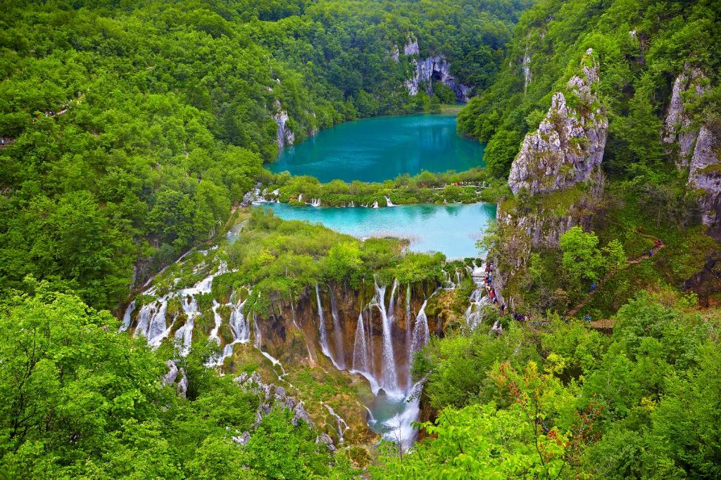 an aerial view of a lake in the mountains at Toncica Sunny terrace with seaview and shaded BBQ area in Metajna