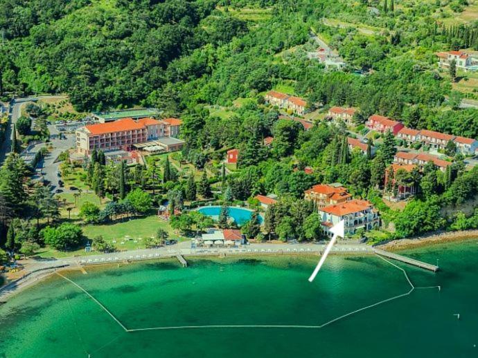 an aerial view of a resort near the water at Vila Školka studio in Portorož