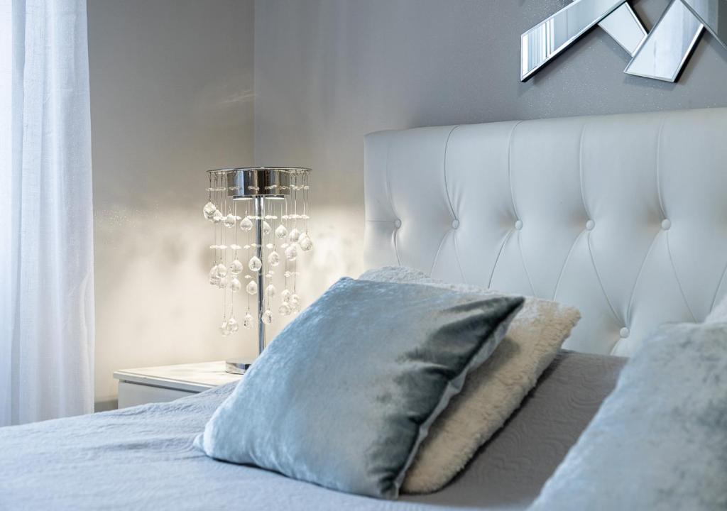 Posteľ alebo postele v izbe v ubytovaní ELEGANT SUITE - in centro PortaNuova