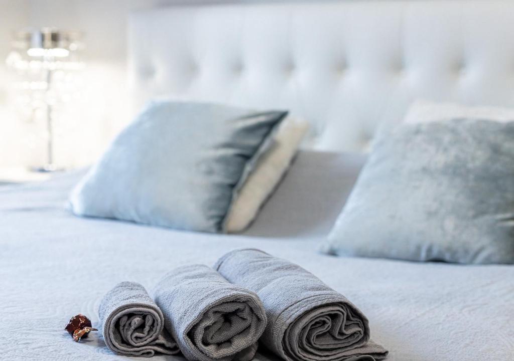 Posteľ alebo postele v izbe v ubytovaní ELEGANT SUITE - in centro PortaNuova