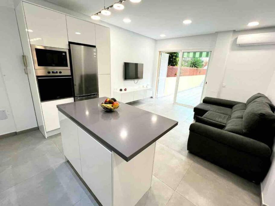 Kuchyň nebo kuchyňský kout v ubytování Precioso apartamento con piscina a 50m de la playa