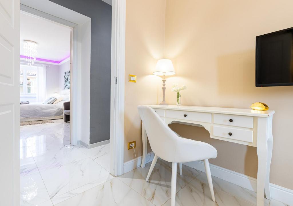Posteľ alebo postele v izbe v ubytovaní ELEGANT SUITE - in centro PortaNuova