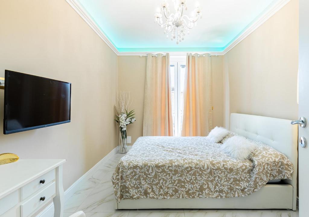 Posteľ alebo postele v izbe v ubytovaní ELEGANT SUITE - in centro PortaNuova