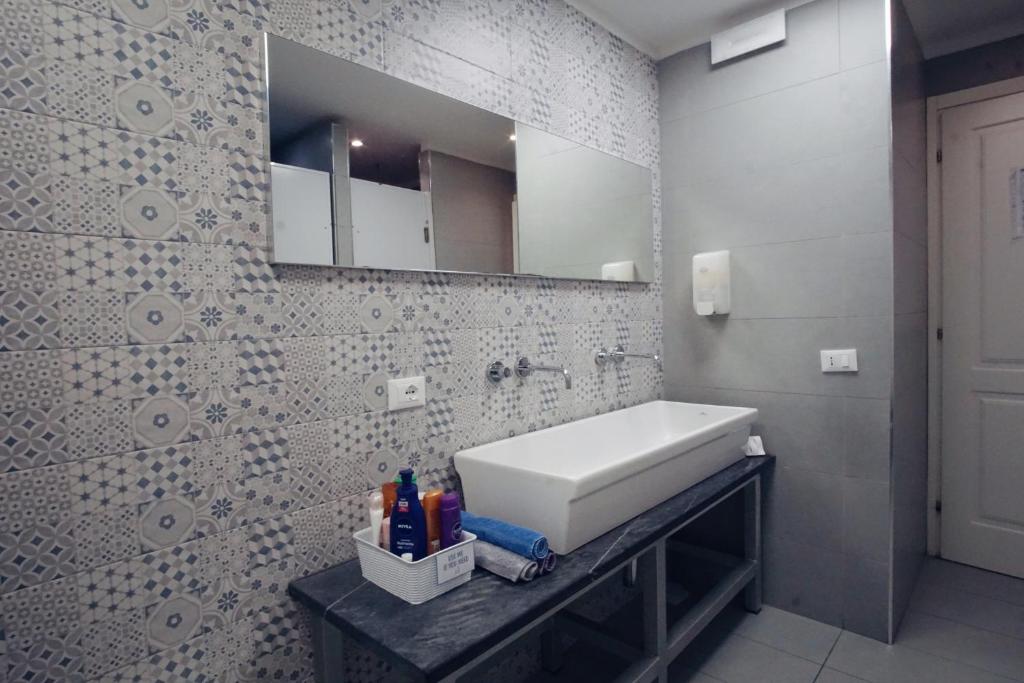 Koupelna v ubytování Grand Hostel Manin