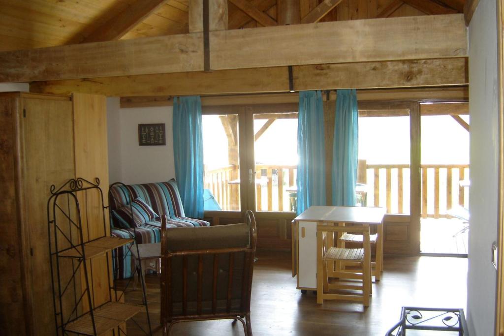 Posezení v ubytování Paysannerie des Versanes - Chambres et gîte