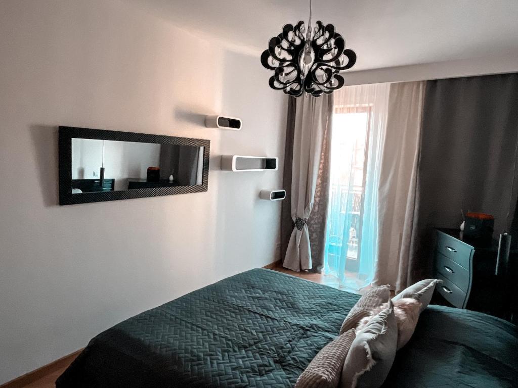 Posteľ alebo postele v izbe v ubytovaní Apartament Solna 80 - Centrum Miasta z podziemnym garażem