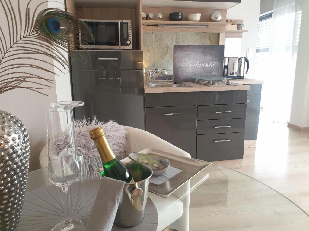 Kuchyň nebo kuchyňský kout v ubytování Appart-Hotel REB_ART